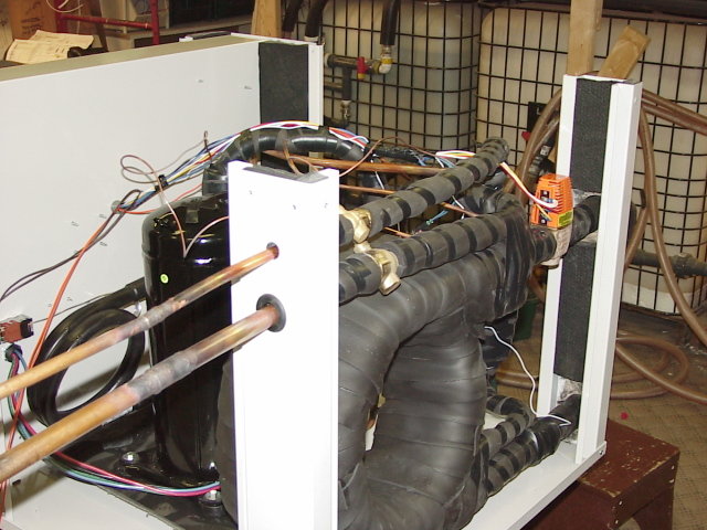 Horizontal split compressor cabinet under assembly; exact model unconfirmed